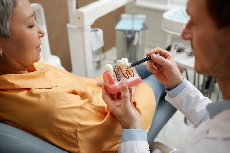 closeup male dentist explaining dental implant surgery patient clinic 236854 50082