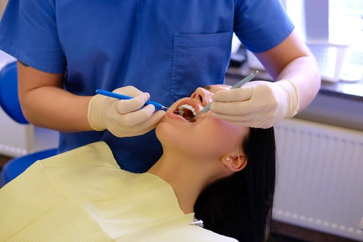 dentist hands working young woman patient with dental tools 613910 21162